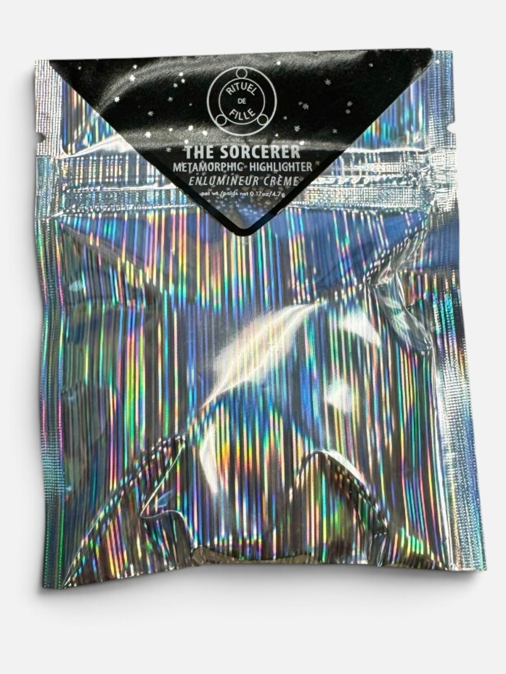 NIP The Sorcerer Metamorphic Highlighter from Rituel de Fille Holographic Pouch